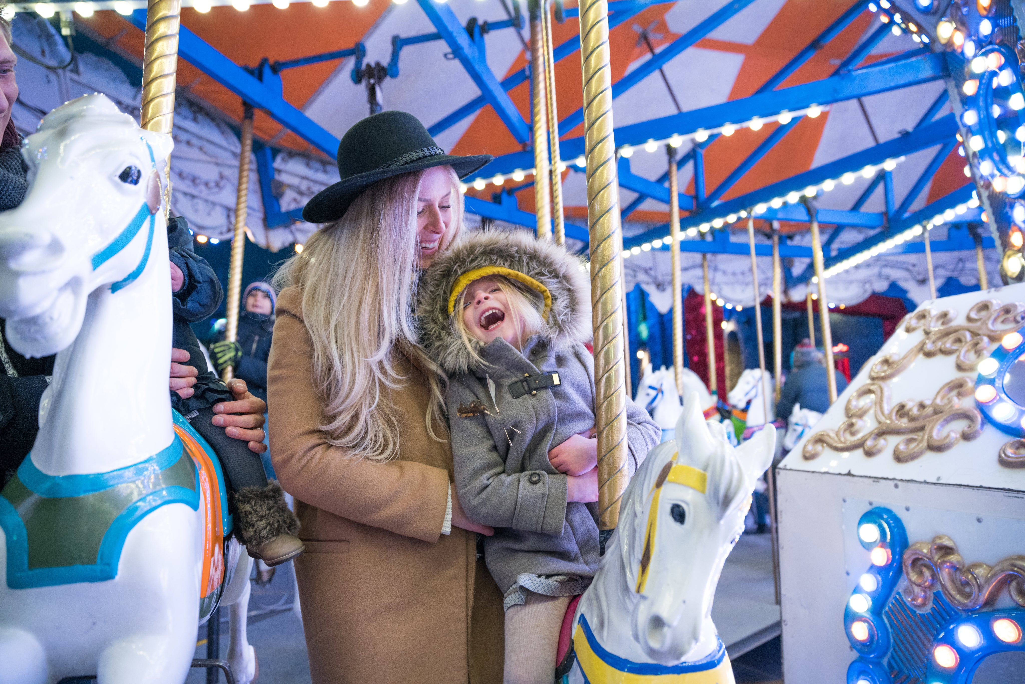 files/laughing-girl-and-mom-on-carousel.jpg